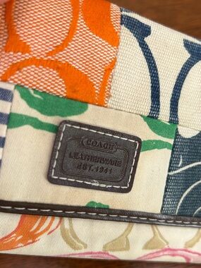 Coach Multicolor Floral Canvas TriFold wallet w/Leather Logo Patch. Patchwork.